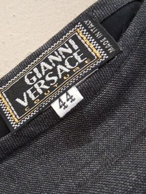 Versace womens Charcoal Black Skirt with Gold Stitching Detail. Made in Italy